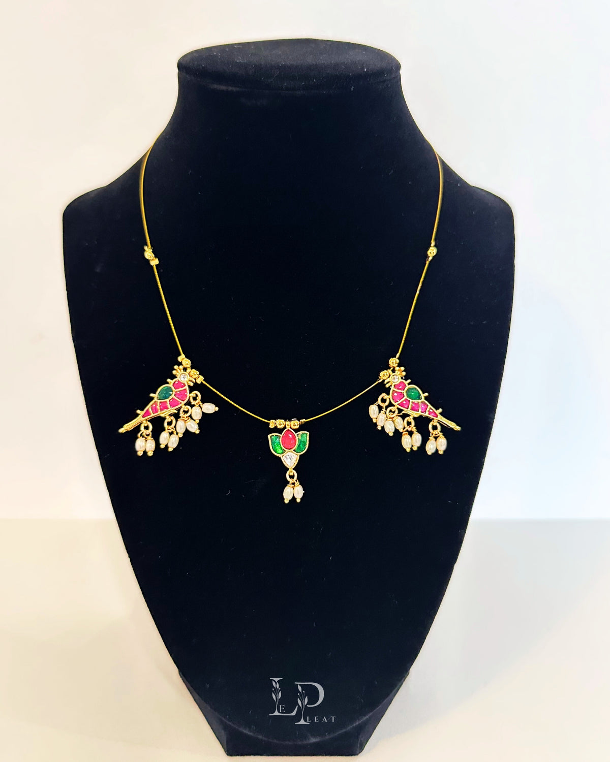Anvi | Delicate Thin Necklace with Lotus and Parrot Design
